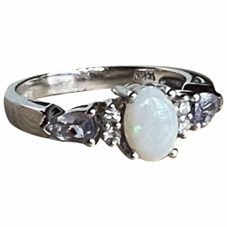 Les créateurs Delicate and so sweet: vintage opal, diamond, and tanzanite ring.  