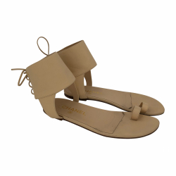 Chanel sandals in sand leather with lace-back ankle band