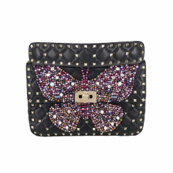 Valentino Garavani Butterfly Spike bag in black leather with pink crystals