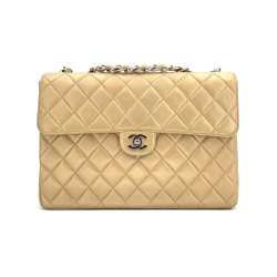 Chanel sac à rabat GM classique vintage en beige champagne avec des accessoires en argent