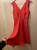Claudie Pierlot Korallenfarbenes Kleid mit Spitzendetails