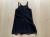 Balenciaga Ultra-cool:  Balenciaga black mini dress.  