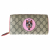 Gucci GG Supreme zip around wallet with Bosco patch