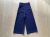 Tibi high-waisted wide-leg cropped trousers, in a soft navy viscose.