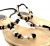 René Caovilla flat T-bar sandals in crystals, faux pearls & black rosettes