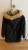 Ted Backer Classic black coat with a hood  lined with faux fur. 