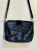 Cosmoparis Crossbody-Tasche aus Leder
