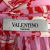 Valentino skirt in pleated pink silk with red flowers