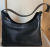 Coccinelle black leather handbag