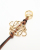 Loewe Anagram Charm in a Gold Finish on a Calfskin Strap