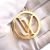 Louis Vuitton AB Louis Vuitton Gold Gold Plated Metal LV Circle Key Holder and Bag Charm Italy