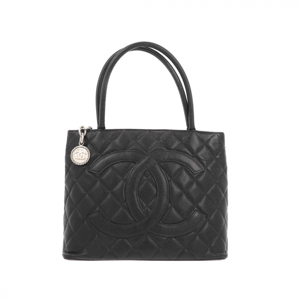 Chanel Medallion Tote bag in caviar leather.