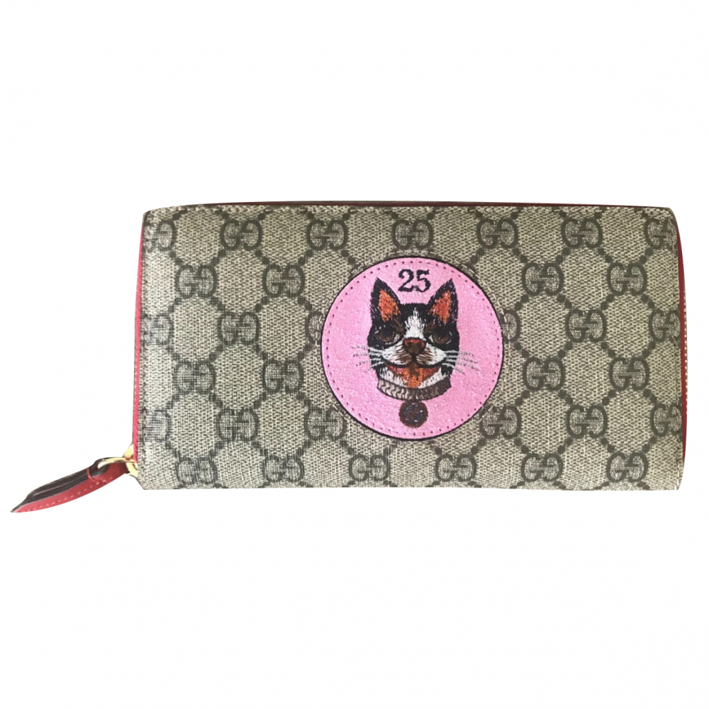 Gucci GG Supreme zip around wallet with Bosco patch
