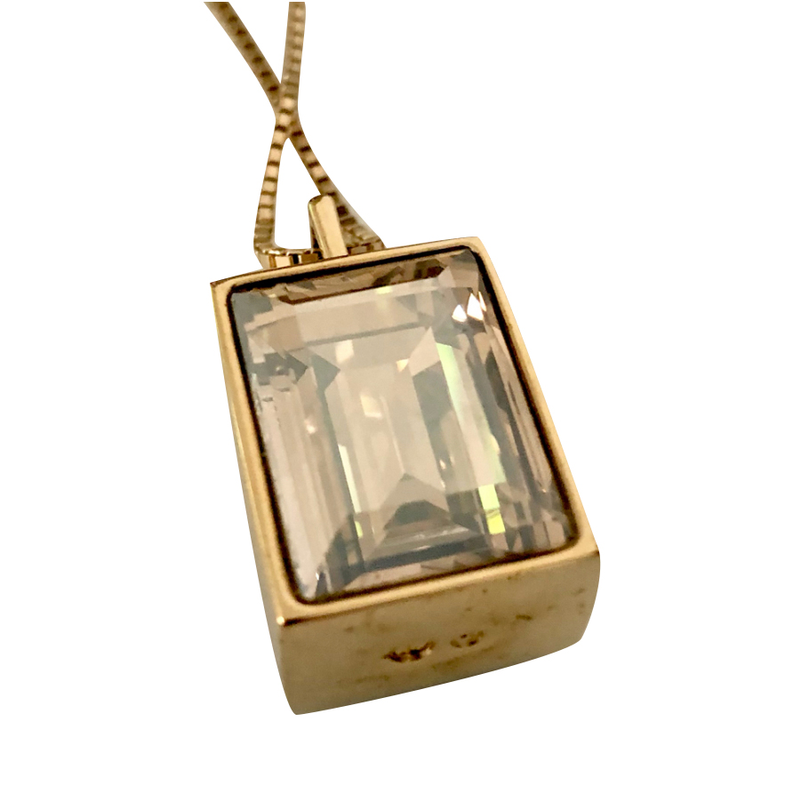 Swarovski Collier avec pendentif double face.