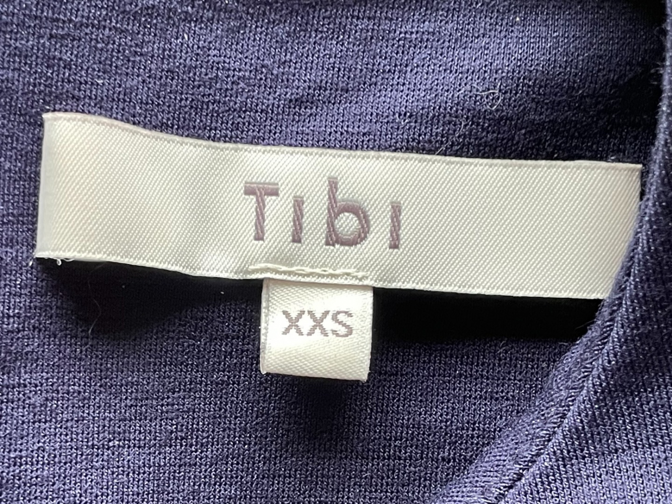 Tibi Modern silhouette:  Tibi's gathered-sleeve relaxed navy top, in a soft viscose blend.