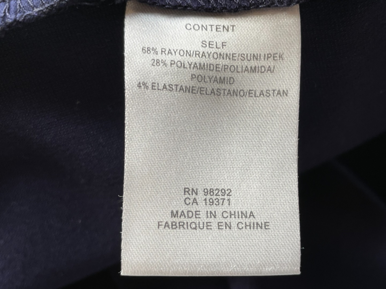 Tibi high-waisted wide-leg cropped trousers, in a soft navy viscose.