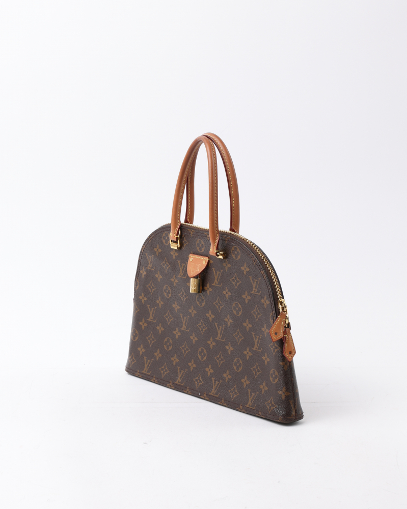 Louis Vuitton Monogram Moon Alma Handbag