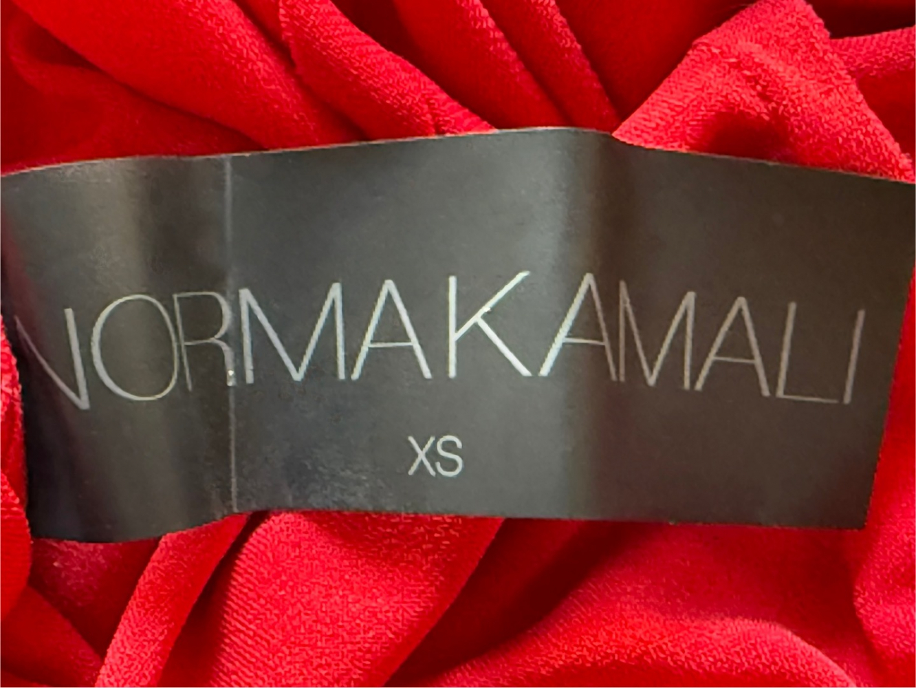 Norma Kamali Combinaison rouge à épaulettes