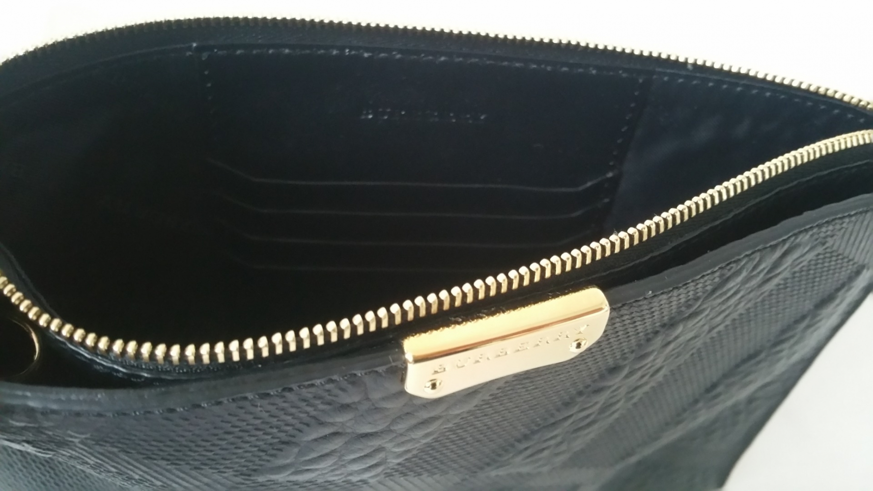 Burberry Clutch Schwarz Leder