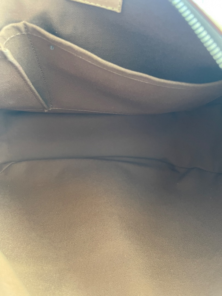 Louis Vuitton Sac à main/corps Tullum