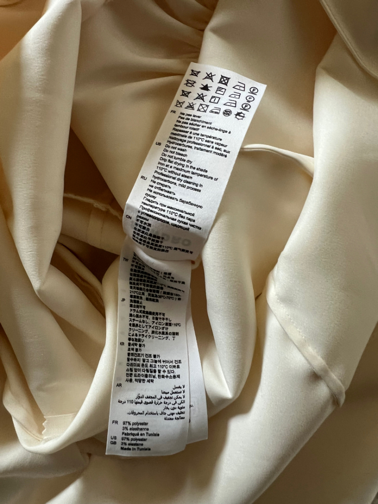 Sandro Neues cremefarbenes langes Kleid