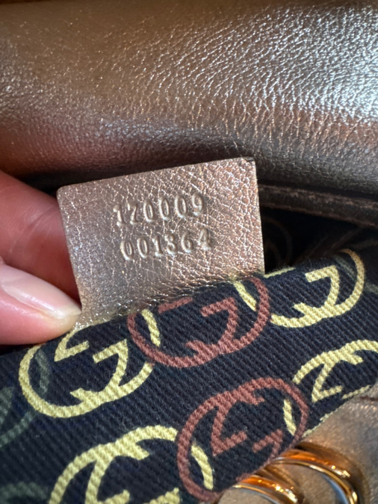 Gucci Petit sac dorée
