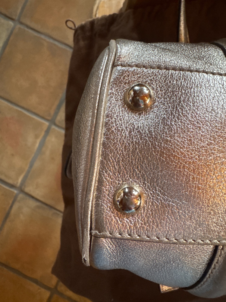 Gucci Petit sac dorée