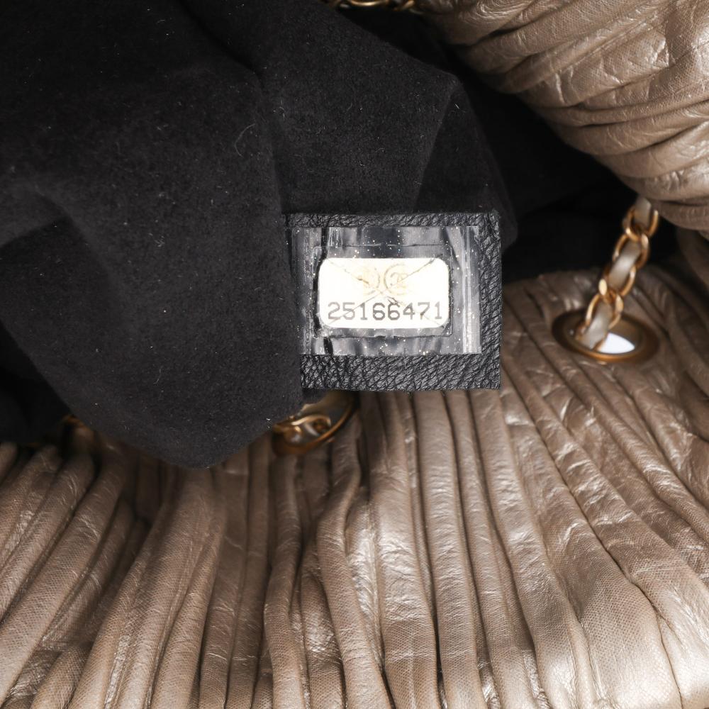 Chanel B Chanel Gold Calf Leather Medium Metallic skin Coco Pleats Drawstring Backpack Italy