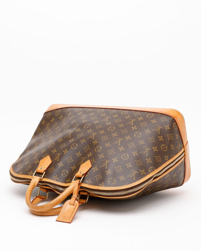 Louis Vuitton Monogram Alma Voyage MM Bag