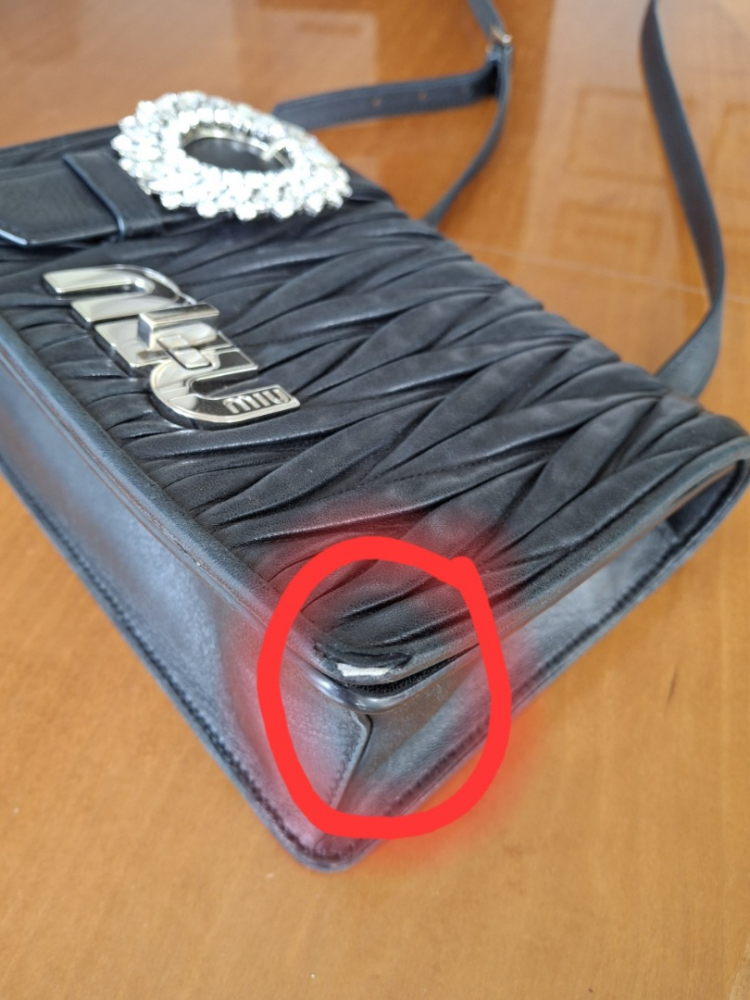 Miu Miu Sac à boucles en matelasse et cristal