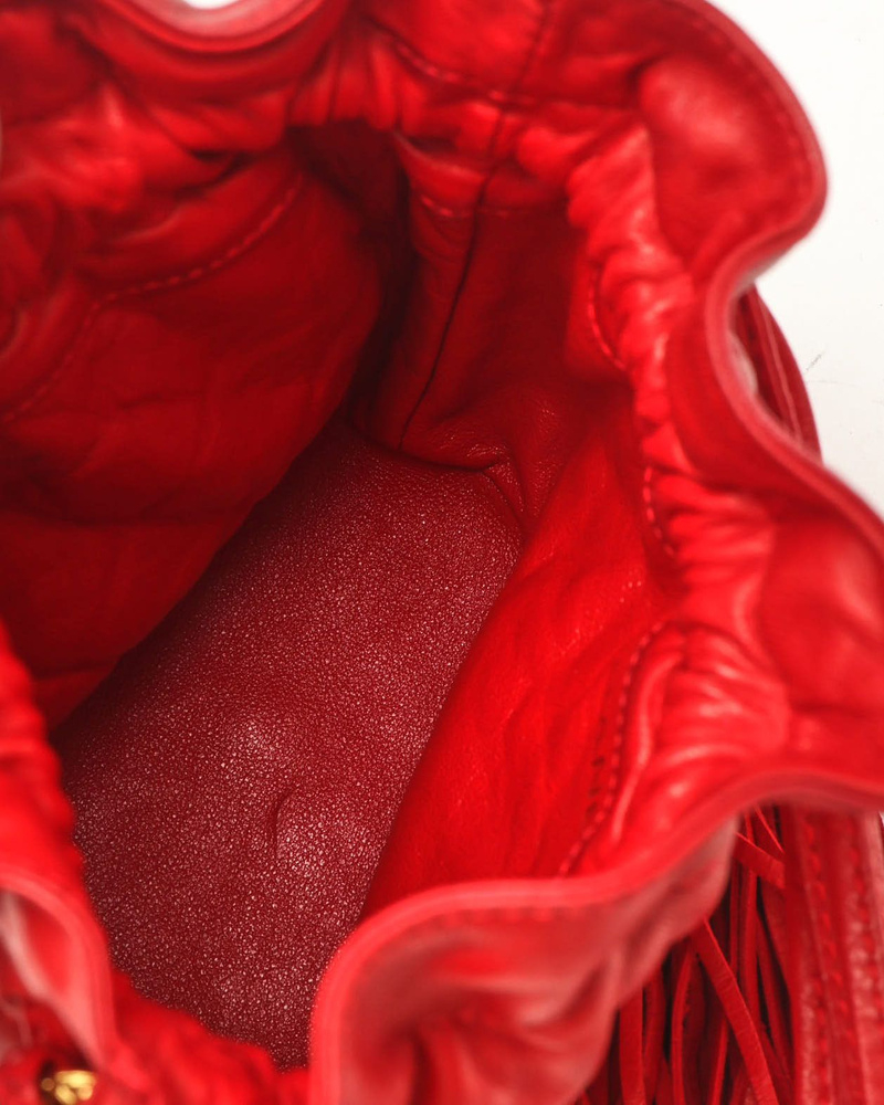 Chanel Quilted Drawstring Tassel Bucket Bag