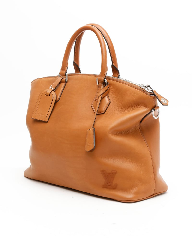 Louis Vuitton Lock It MM Bag