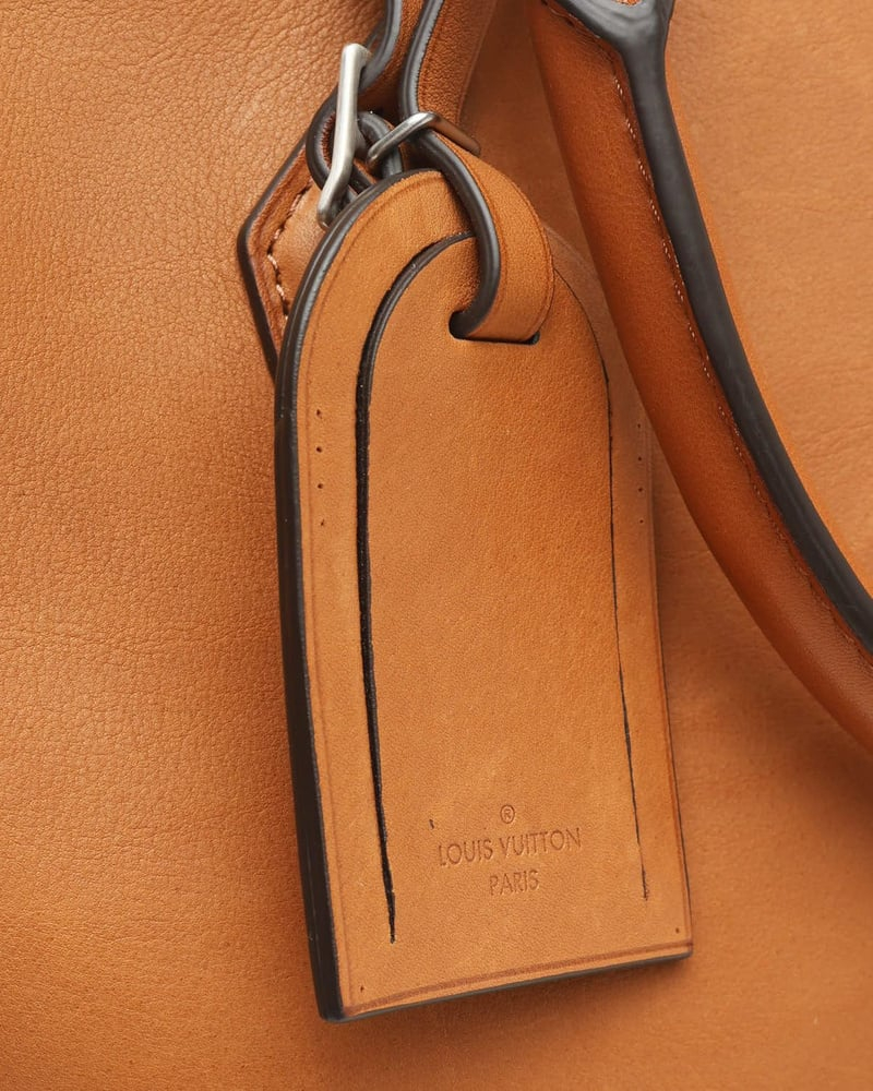 Louis Vuitton Lock It MM Bag