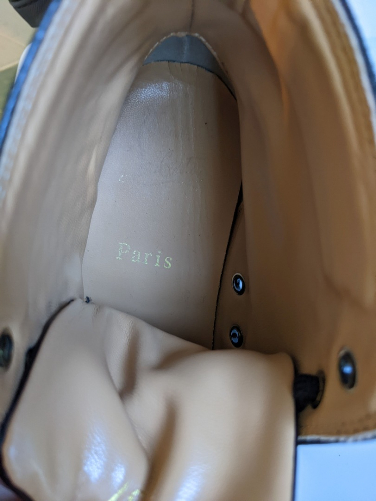 Christian Louboutin Schwarze Sneakers aus Leder und Spikes 37