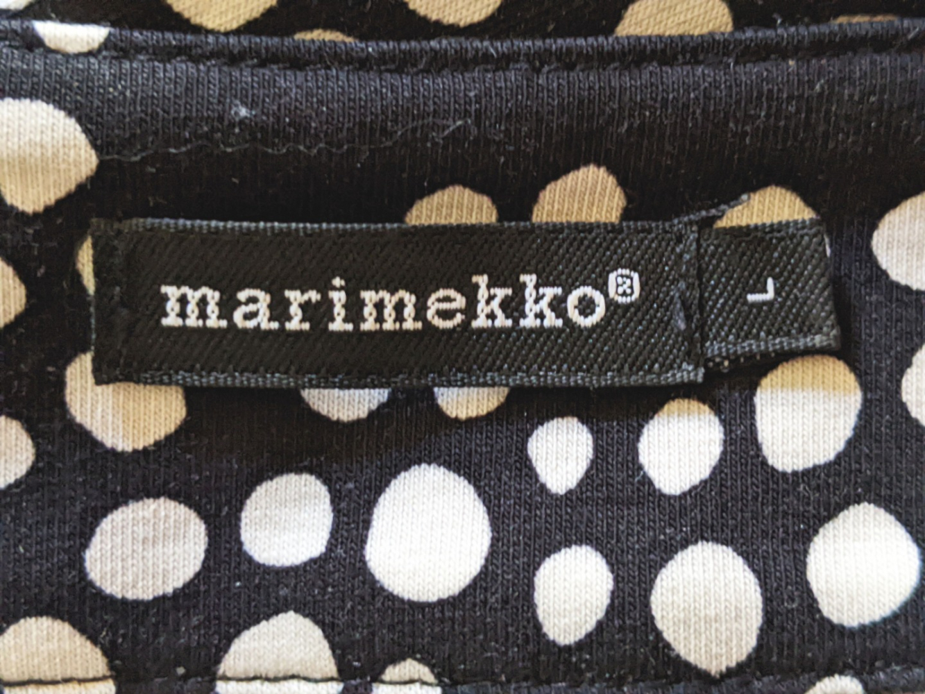 Marimekko : Tunic dress with cream polka dots on a black background L