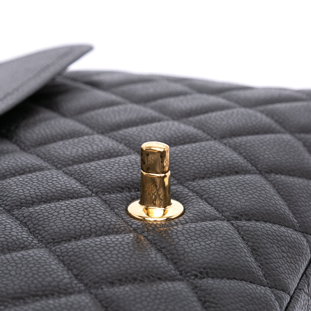 Chanel Classic Double Flap Maxi Caviar Leather Quilted Shoulder Bag Black
