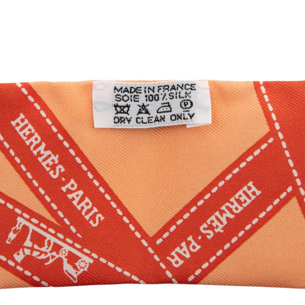 Hermès A Hermès Orange Silk Fabric Bolduc Twilly Scarf France