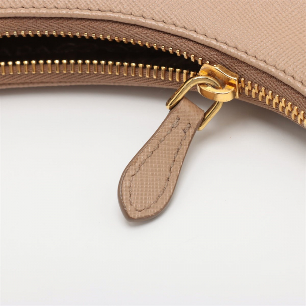 Prada Re-Edition 2005 Leather Pouch Crossbody Beige