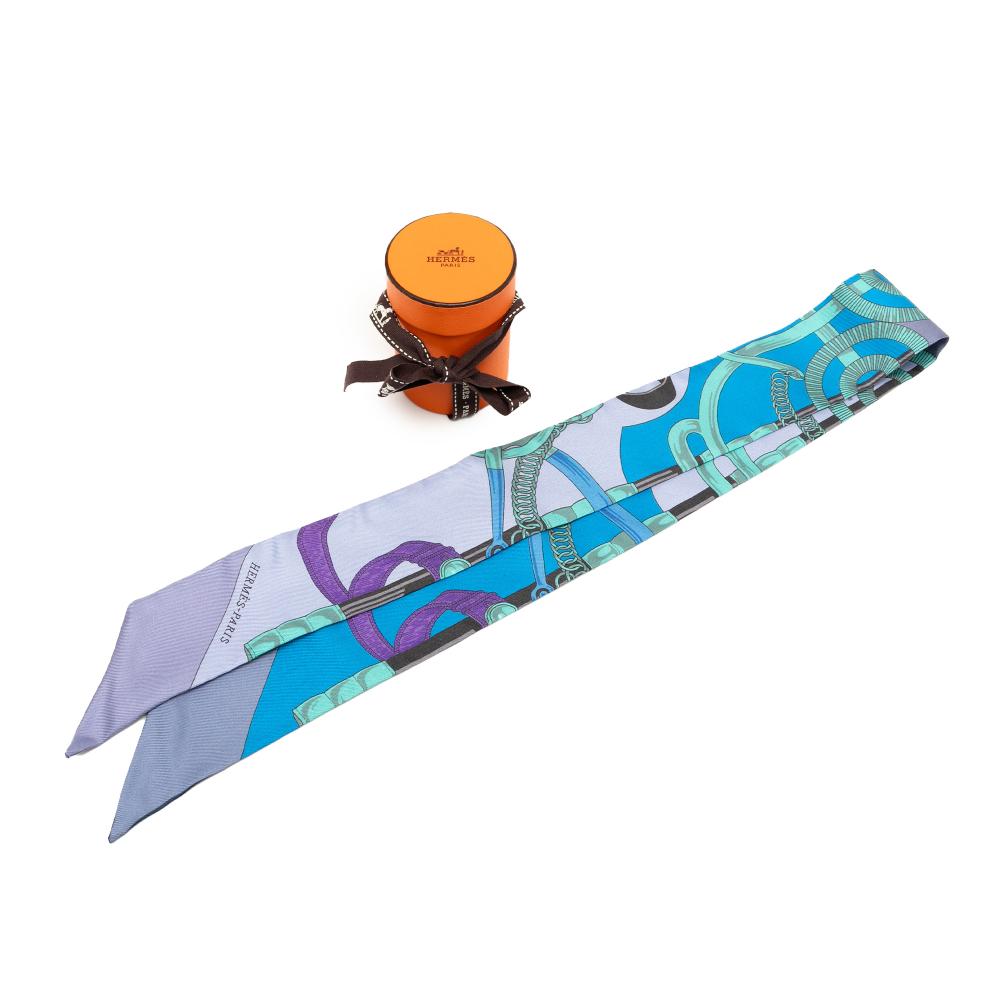 Hermès A Hermès Blue with Purple Silk Fabric Eperon D Or Twilly Scarf France
