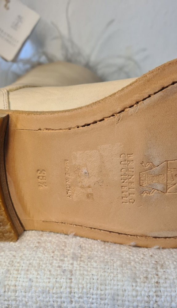 Brunello Cucinelli High boots with natural feathers