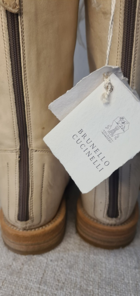 Brunello Cucinelli High boots with natural feathers