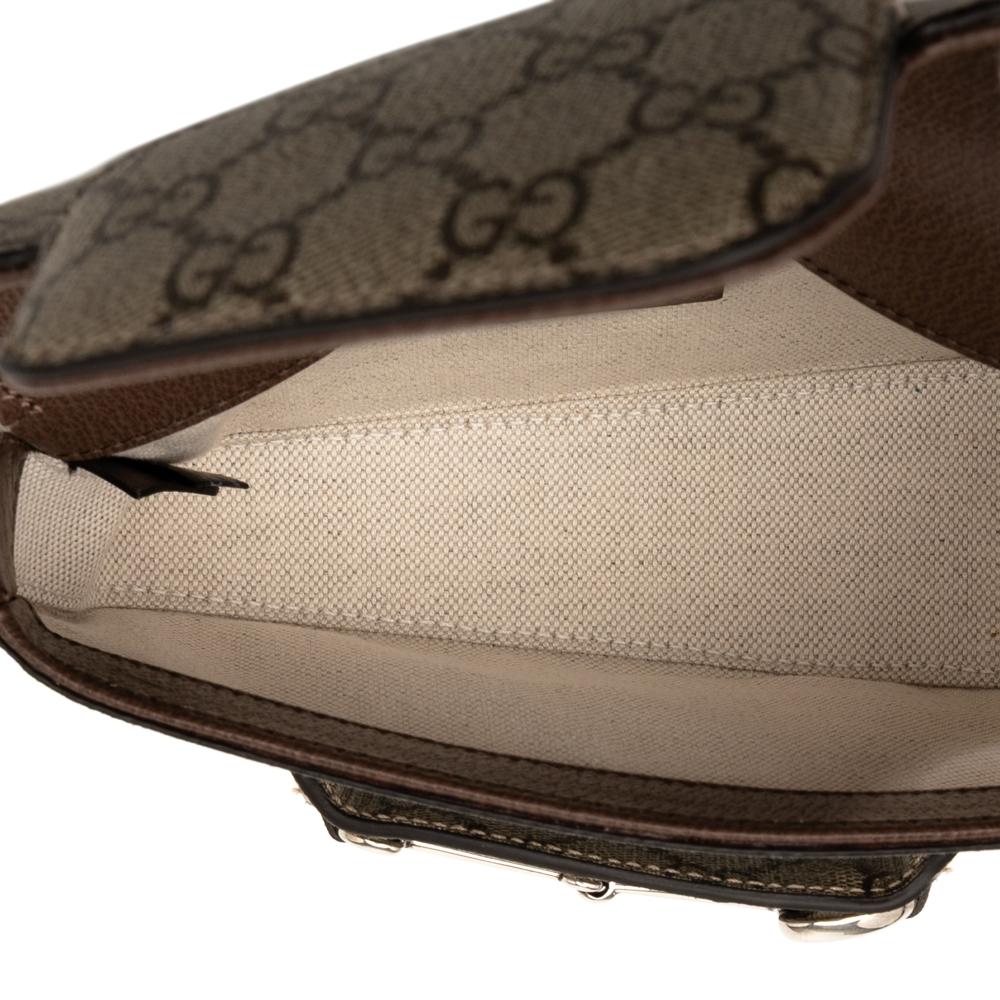 Gucci Brown Beige Coated Canvas Fabric Mini GG Supreme Asymmetric Horsebit 1955 Shoulder Bag Italy