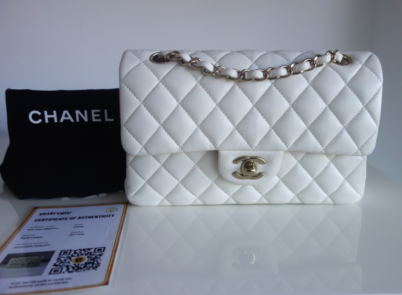 Chanel Classique 11.12 white bag