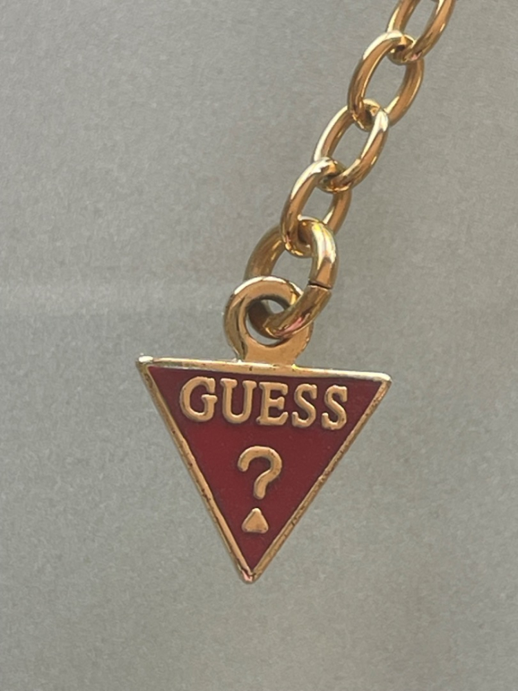 Guess Collier doré avec des cristaux Swarovski