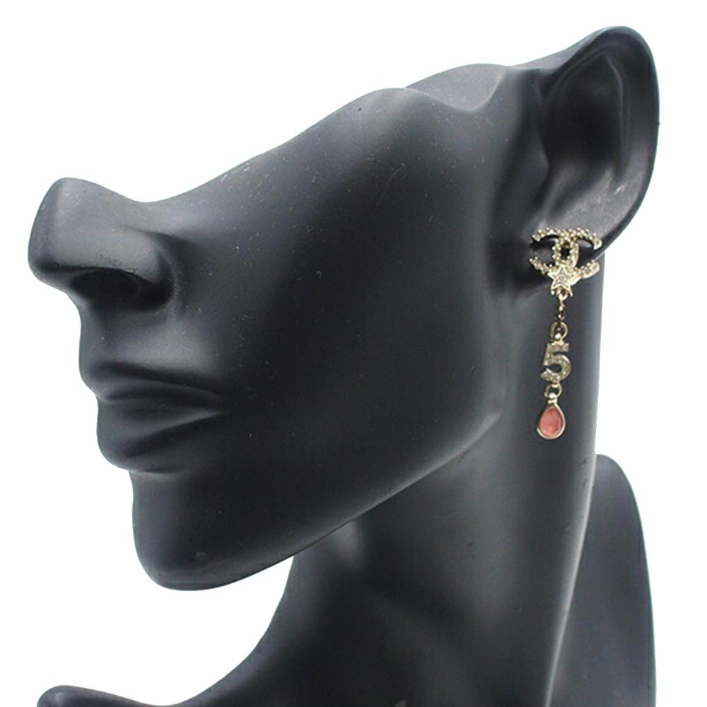 Chanel Gold Gold Plated Rhinestone CC Star No.5 Bijoux Swing Push Back Earrings France