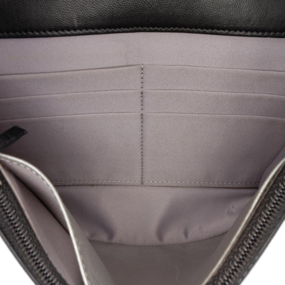 Chanel B Chanel Black Lambskin Leather Leather CC Embossed Lambskin Camellia Wallet On Chain France