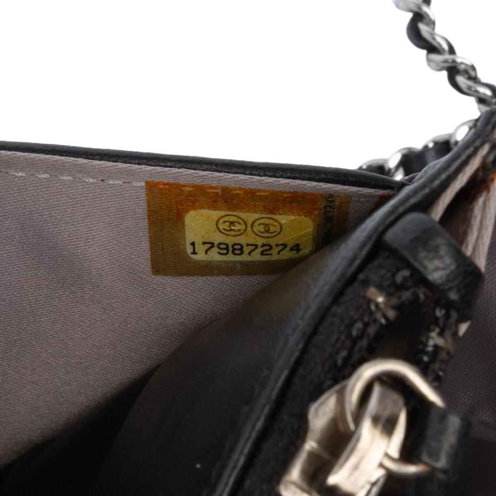 Chanel B Chanel Black Lambskin Leather Leather CC Embossed Lambskin Camellia Wallet On Chain France