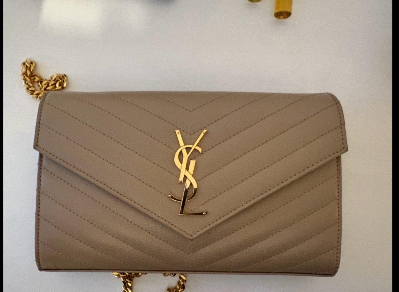 Yves Saint Laurent Wallets on chain