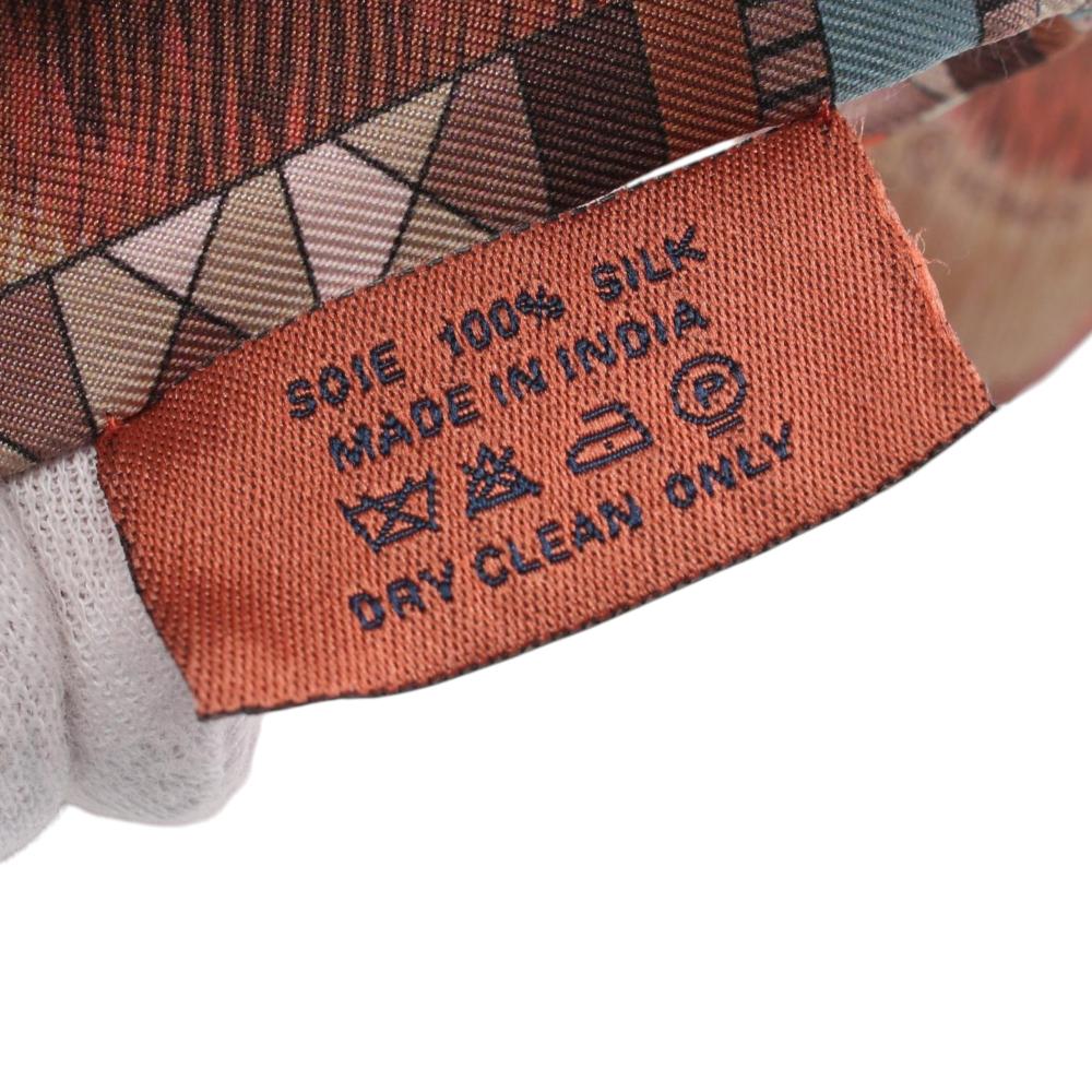 Hermès AB Hermès Brown Light Brown Silk Fabric Beaded Pelages et Camouflage Precieux Twilly Scarf India