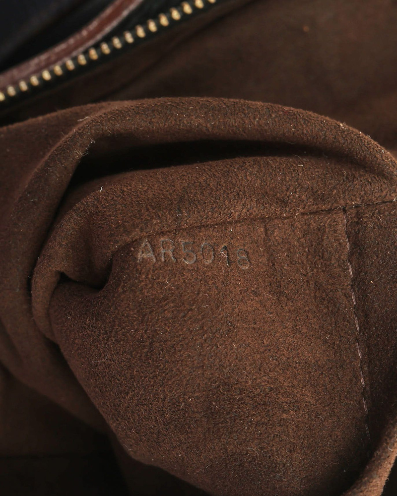 Louis Vuitton Monogram Mahina XS Shoulder Bag